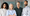 A team of four colleagues standing close together and looking at the camera.